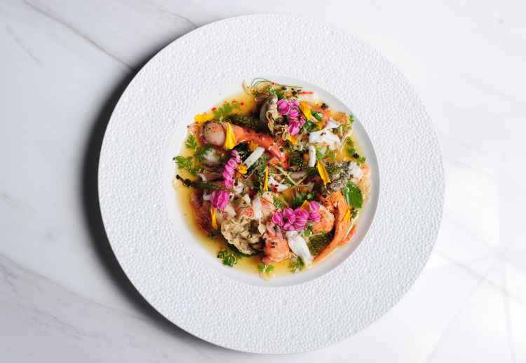 Andaman-sea-lobster,-lemongrass,-young-ginger,-kaffir-lime-juice,-mandarin-juice,-buzz-button-flowers,-young-coconut-&-crispy-fish-skin.---.jpg