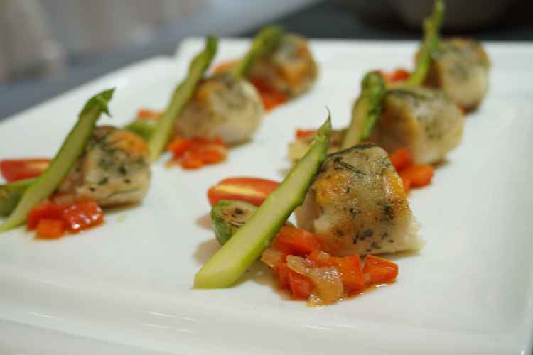 Oven Roasted Cod Cover with Herb Scallop Mousse & Paprika Oil Crouton,Scallop & Srimp Striped Ravioli,Warm Vegetable Garnish,Butter Lemon Cream Sauce.JPG