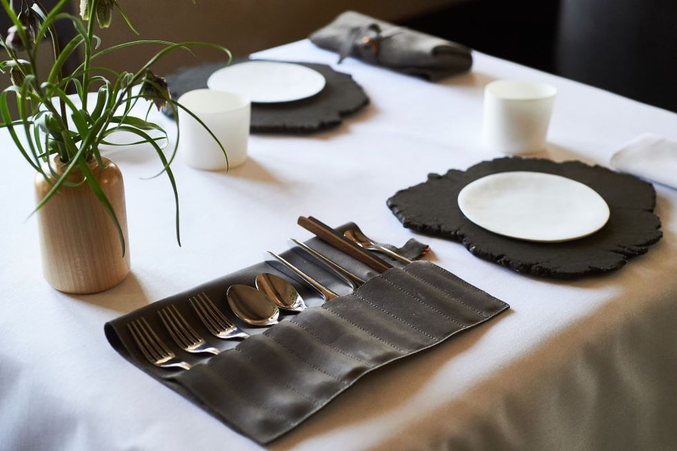 the-satchel-of-flatware-that-is-delivered-to-a-diners-table-news-photo-1580842216.jpg